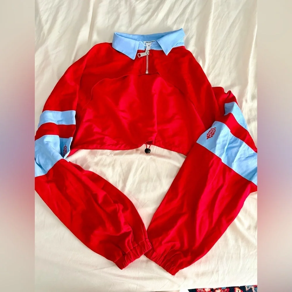 Free people movement swift windbreaker red arm cover medium